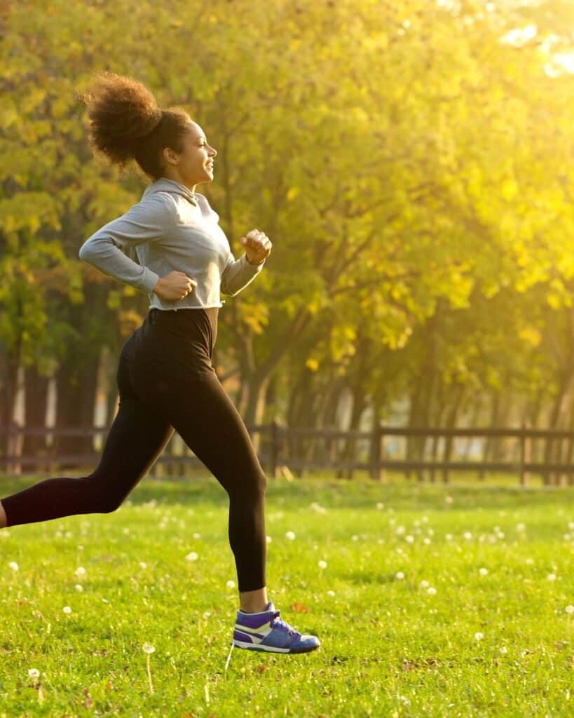 Photo of a woman jogging in a park