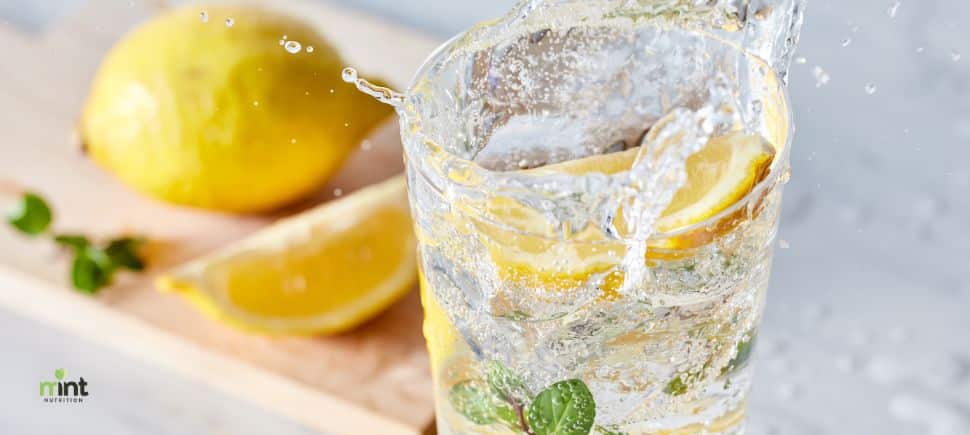 Glass of water infused with lemon and mint for hydration, detox support, and weight loss – nutrition counseling in Mooresville NC