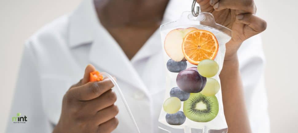 IV hydration therapy with fruits representing vitamins and antioxidants, symbolizing immune system support and wellness in Mooresville, NC at PHC Wellness