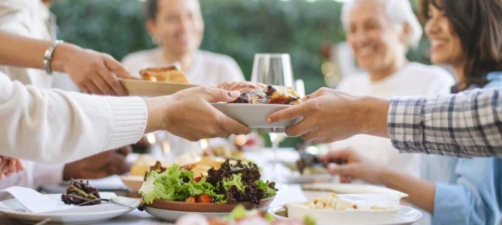 Family sharing a healthy meal together to support balanced eating habits for sustainable weight loss in Mooresville NC